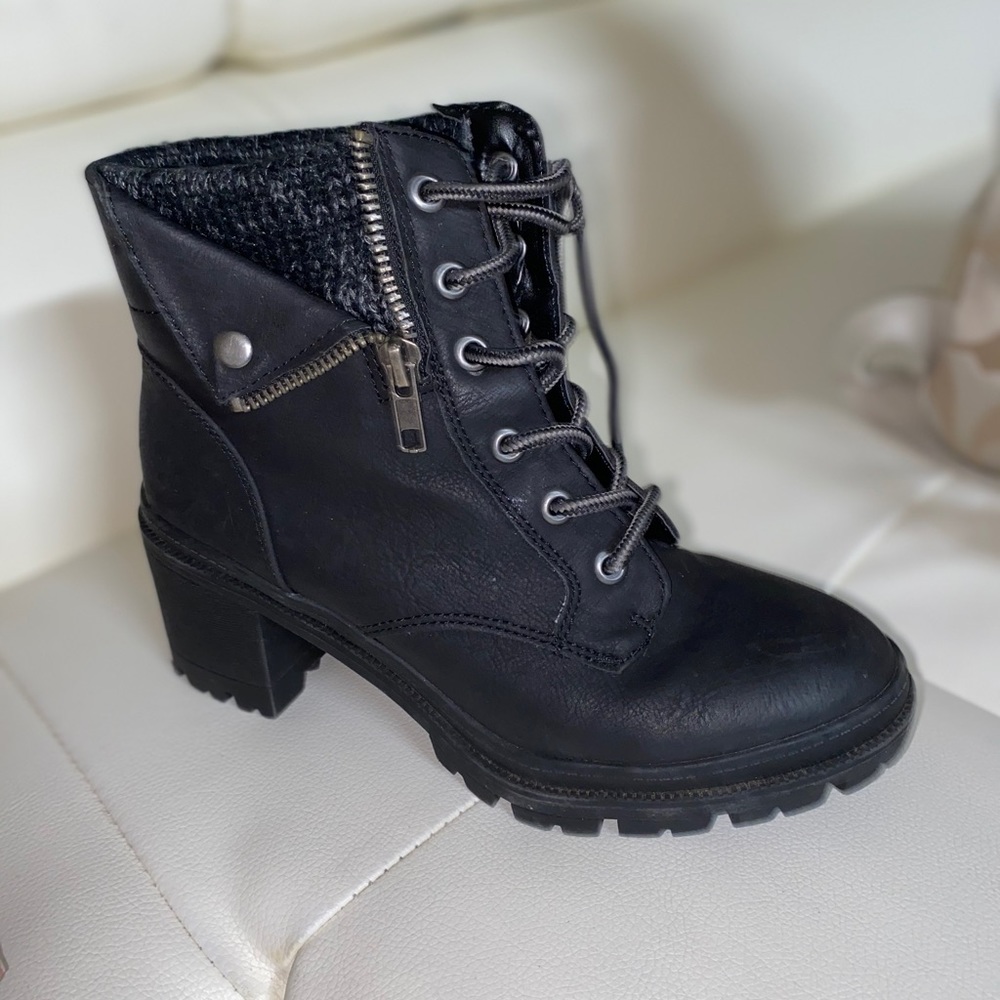Black heeled moto boots